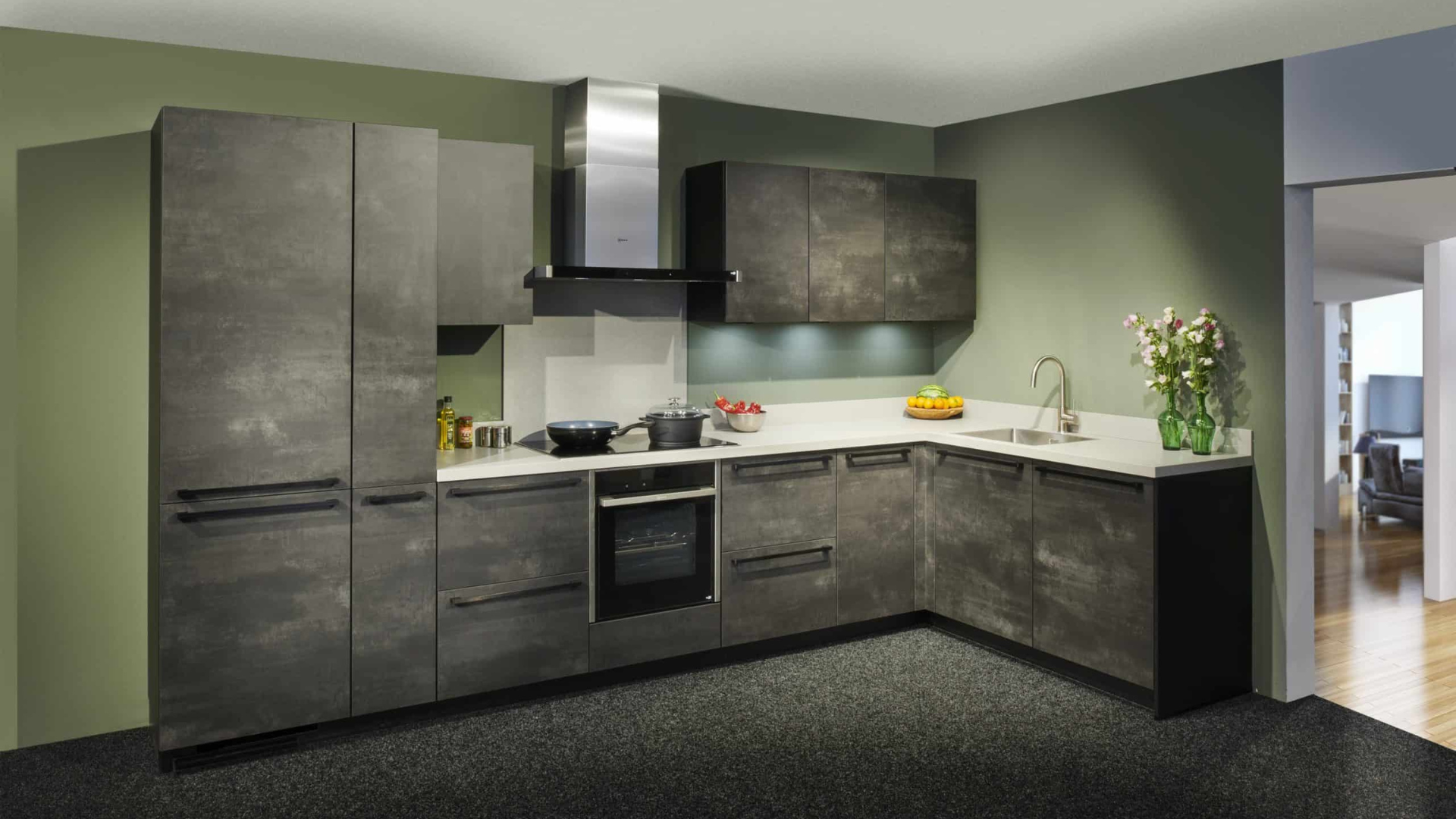 Industriële hoekkeuken donker beton