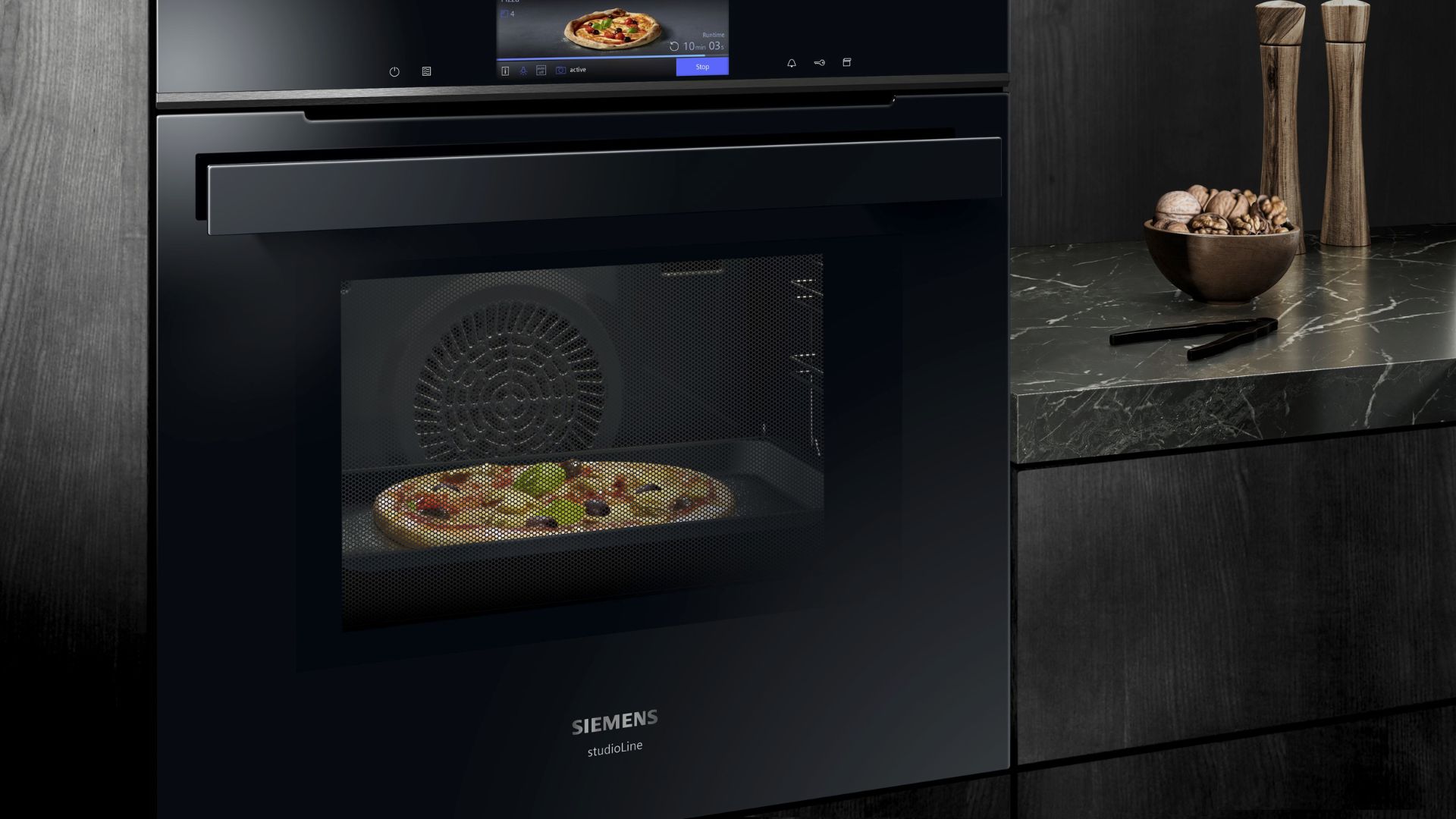 Siemens magnetron met een pizza erin